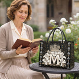 Catholight  The Divine Monogram Leather Bag